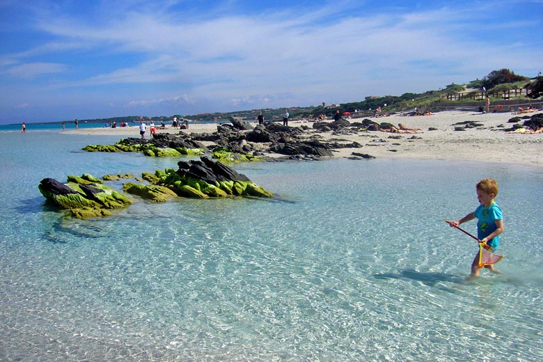 The shallow beach at La Pelosa is ideal for kids