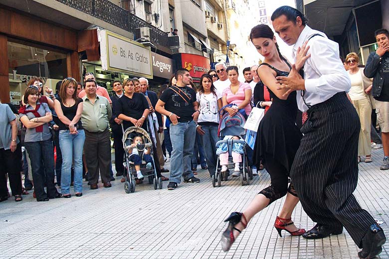 Dancing tango in the street on a Sunday