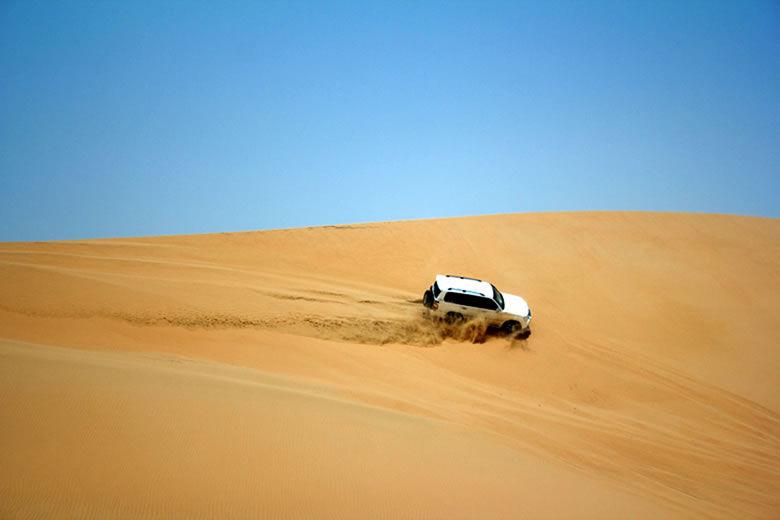 Cruising the dunes on a 4x4 desert safari in Dubai