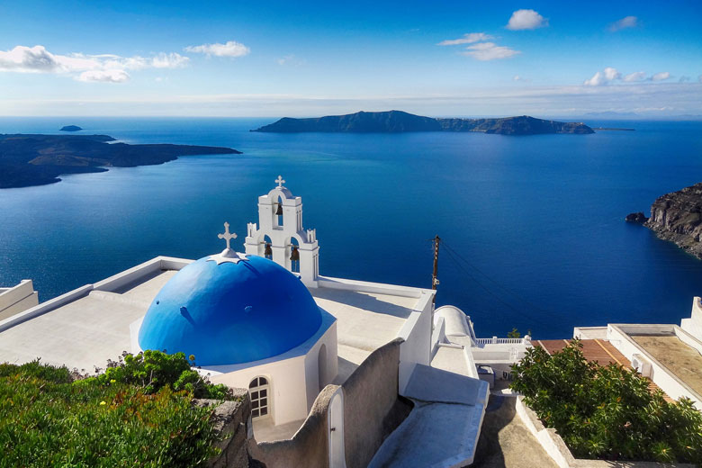 An iconic Santorini view - seascape and blue dome included