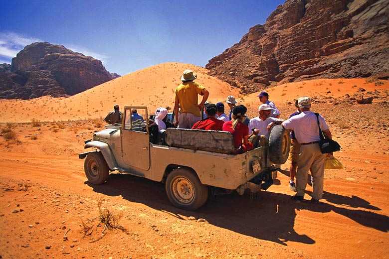 Gazing across the rust-orange landscape of Wadi Rum