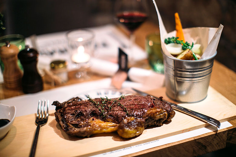 Tuck in to juicy steak at Paparazzo Steak House