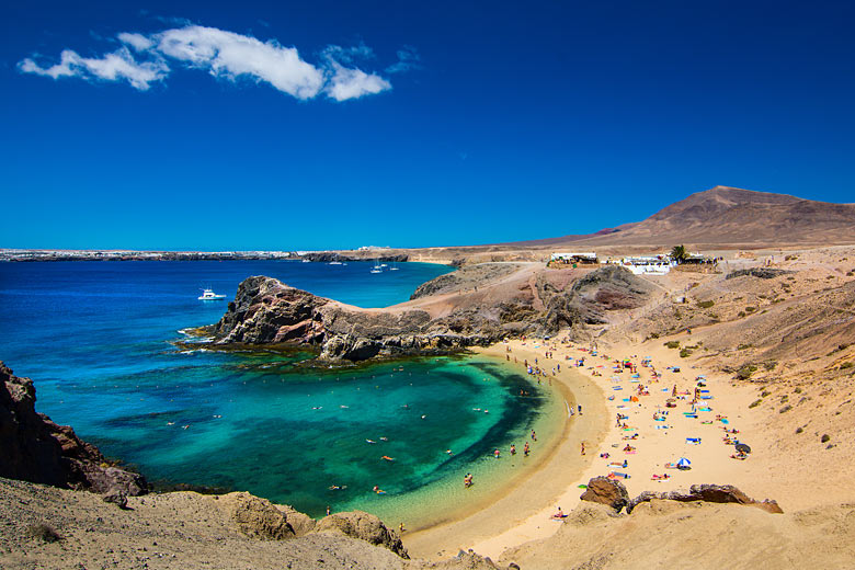 The inviting arc of Playa de Papagayo, Lanzarote, Canary Islands © Paolo Tralli - Dreamstime.com