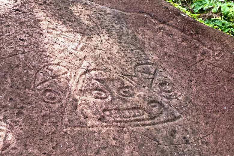 Spy prehistoric rock art in the Layou Petroglyph Park