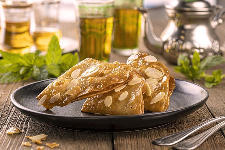Briouat, Moroccan sweet pastry dipped in honey