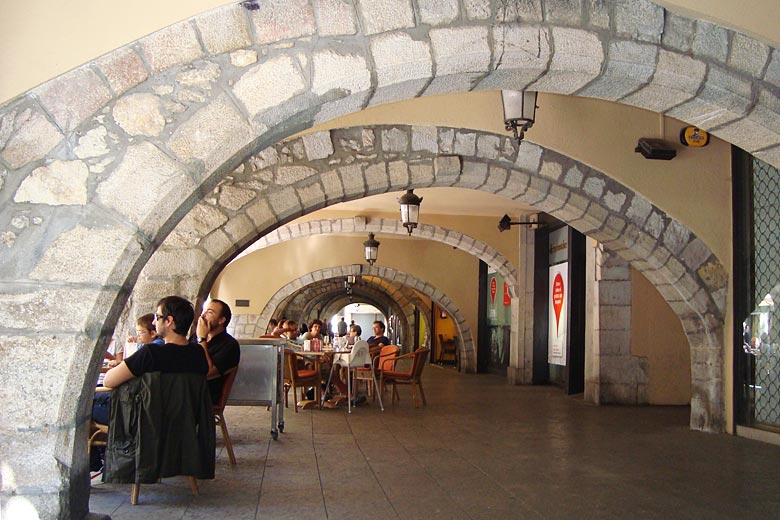 Coffee under the arches of Rambla de la Llibertat, Girona