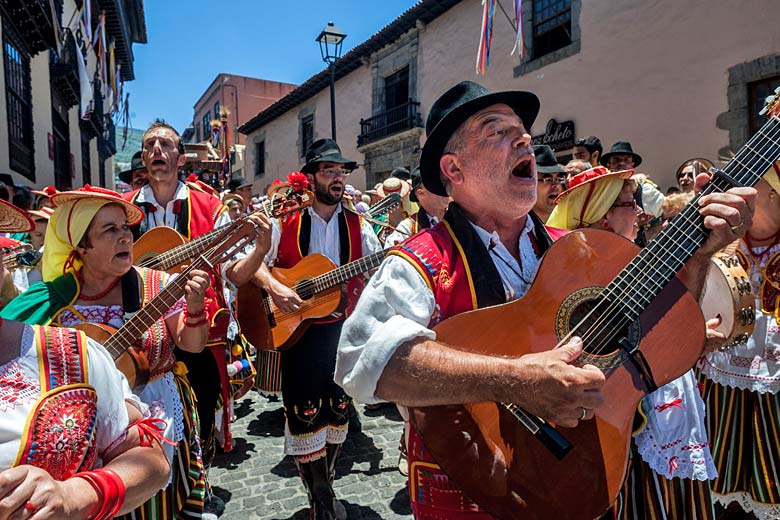 Singing and dancing in the street at a romería in La Oratava
