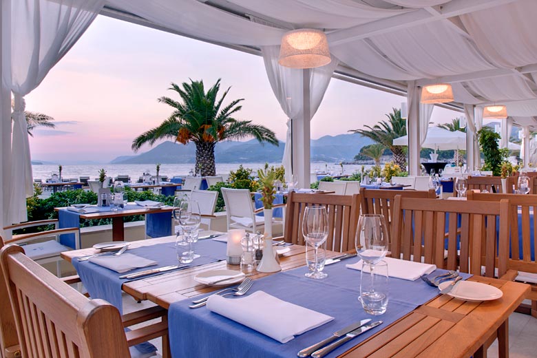 Watch the sunset from the hotel's beachfront Miramare Restaurant