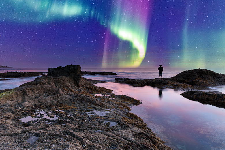 Spy the Aurora Borealis over the sea Spy the Aurora Borealis over the sea