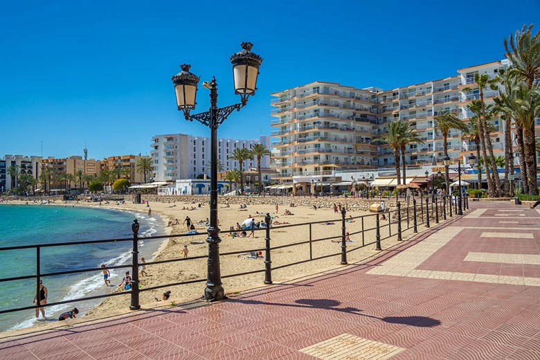 The golden arc of Santa Eulalia's beach