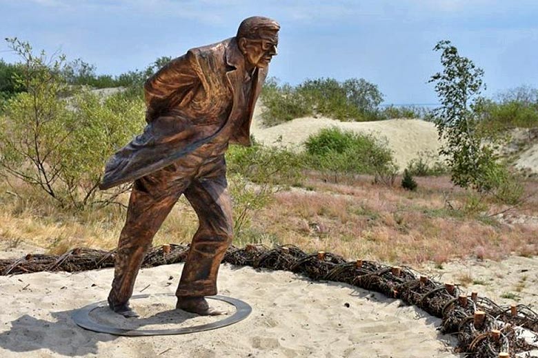 Bronze statue of famed French philosopher Jean-Paul Sartre atop the Parnidis Dune Bronze statue of famed French philosopher Jean-Paul Sartre atop the Parnidis Dune