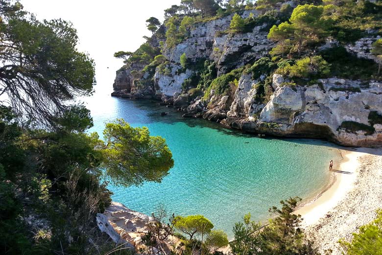 Cala Macarelleta, one of many secluded coves around the coast of Menorca Cala Macarelleta, one of many secluded coves around the coast of Menorca