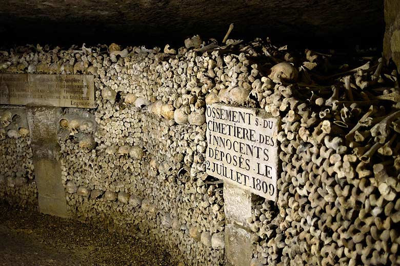 Inside the creepy Catacombs, Paris © Joe deSousa - Wikimedia Commons
