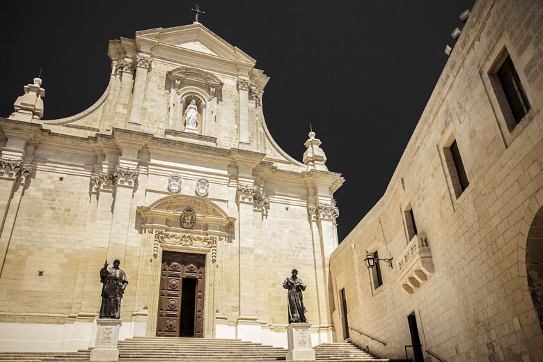 The ornate façade of the Cathedral of the Assumption in the Cittadella The ornate façade of the Cathedral of the Assumption in the Cittadella