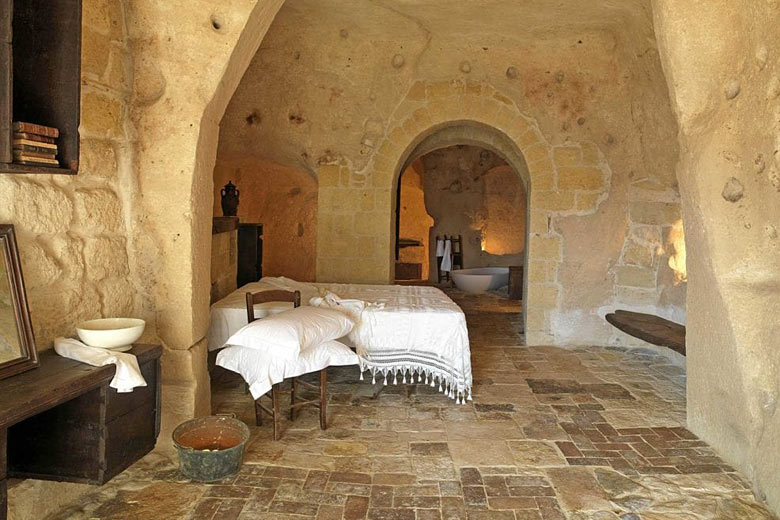 Cave room in Sextantio's Grotto della Civita hotel Cave room in Sextantio's Grotto della Civita hotel