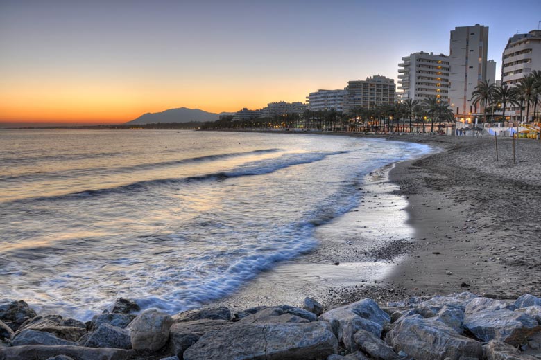 Cheap car hire Malaga Airport: Sunset on Marbella Beach