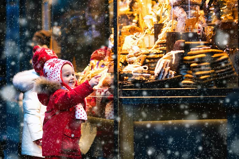 Children shopping for chocolate treats Children shopping for chocolate treats