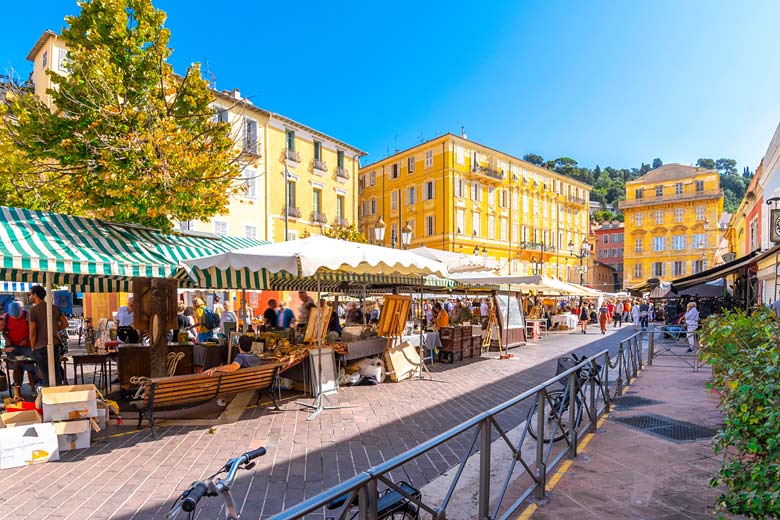 Explore the Cours Saleya Market bursting with local produce
