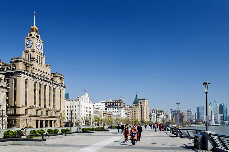 Enjoy a stroll past Customs House along the Bund