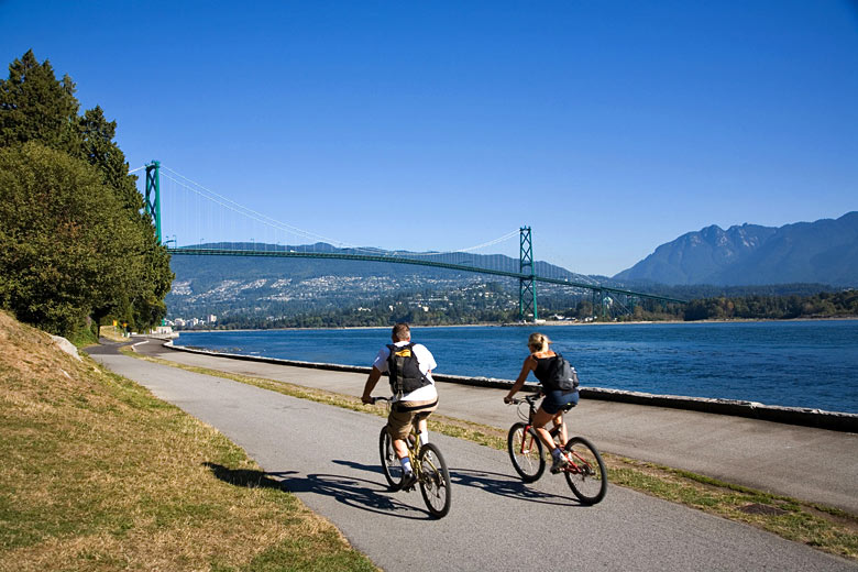 Cycling in Stanley Park, Vancouver © Chris Howes Wild Places Photography - Alamy Stock Photo