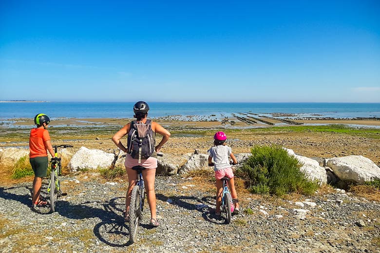 Cycling on the low-lying shore of Île de Ré Cycling on the low-lying shore of Île de Ré