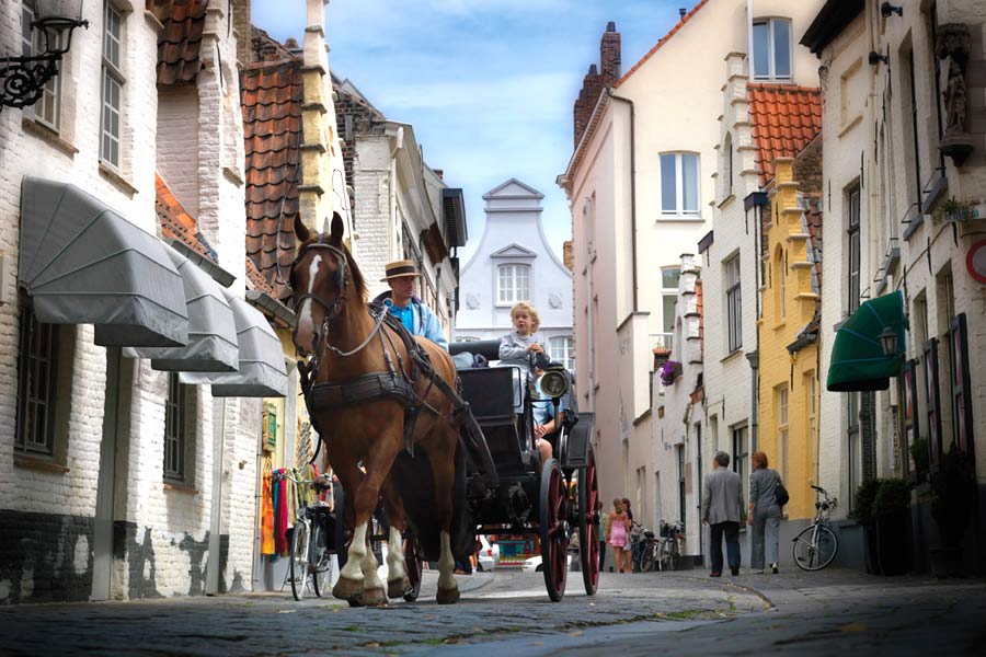 Driving through the streets of Bruges, Belgium Driving through the streets of Bruges, Belgium