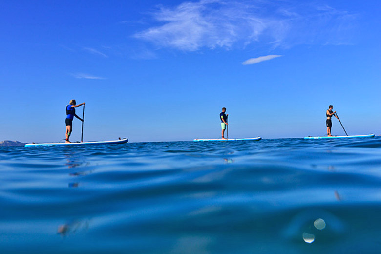 When the sea is calm stand up paddleboarding is a great way to explore - photo courtesy of Mark Warner