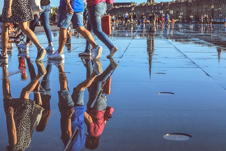 Stroll across the famous Miroir d'eau, or Mirror fountain