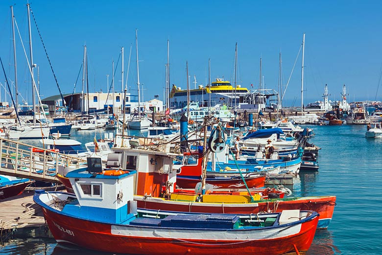 Colourful fishing boats in Corralejo harbour
