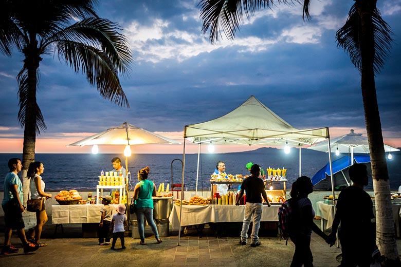 Food stalls along the Malecon as night falls © Carlos Mora - Puerto Vallarta Tourism