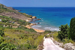 8 of Gozo's best sand & pebble beaches