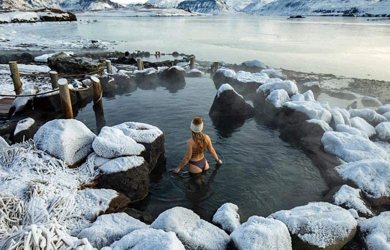 Taking a dip in Hvammsvik Hot Springs