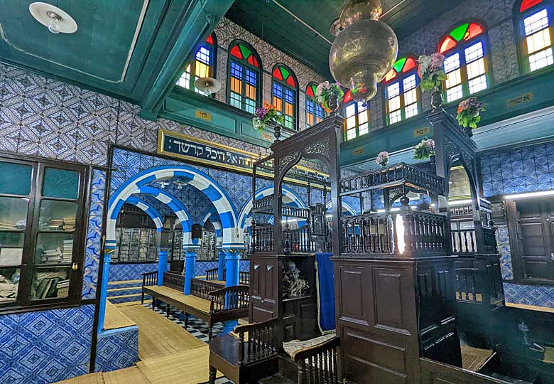 The colourful sanctuary inside the El Ghriba Synagogue