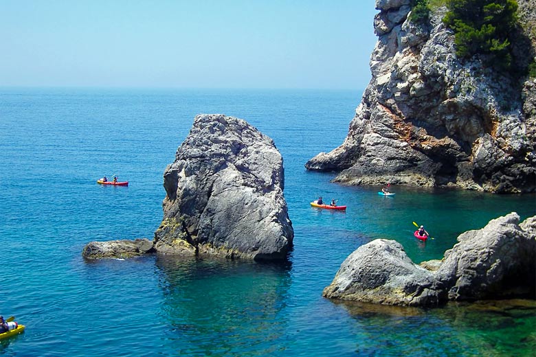 Kayakers below Dubrovnik's City Walls Kayakers below Dubrovnik's City Walls