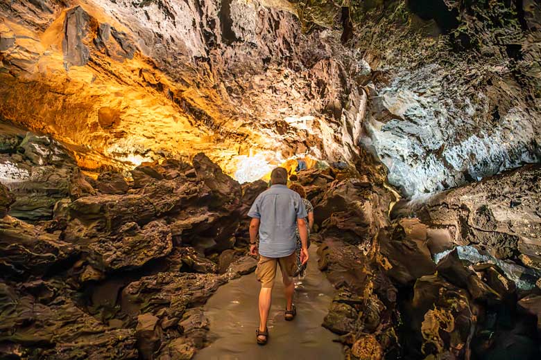 Walk through a lava tube at La Cueva de los Verdes