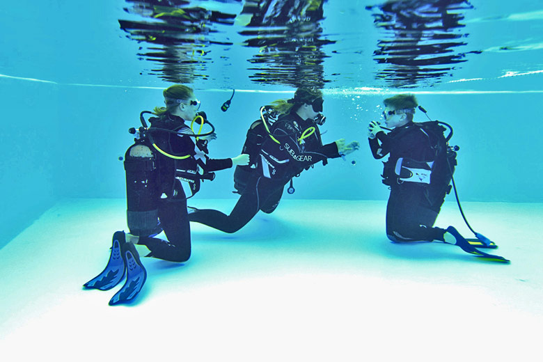 Learning the basics of scuba in the pool with Mark Warner - photo courtesy of Mark Warner