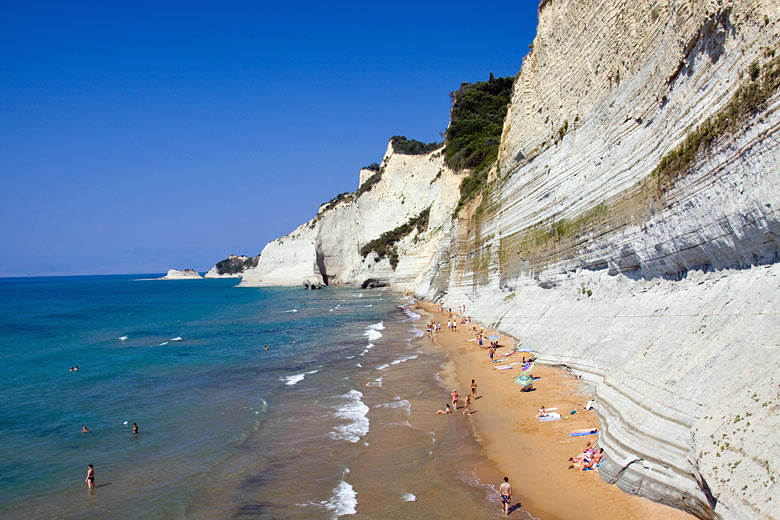 Lounge beneath the white cliffs above Loggás Beach