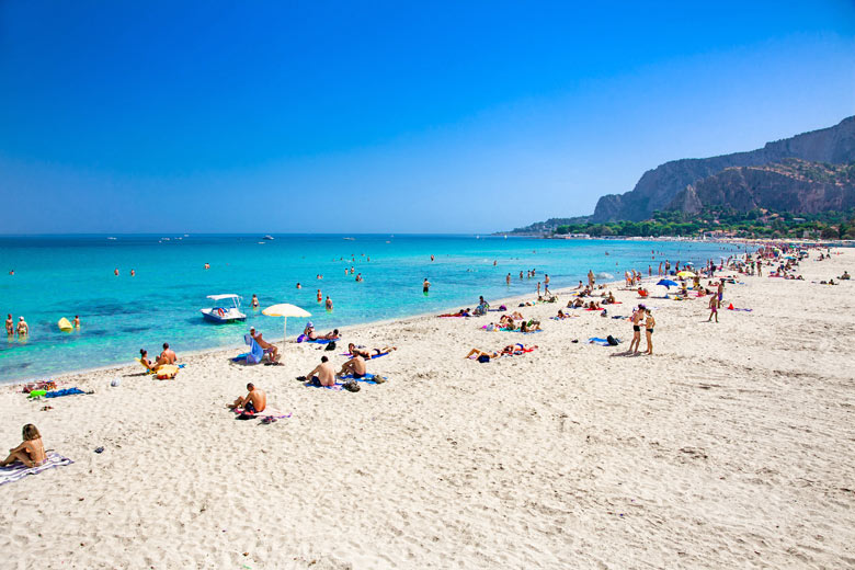 The appealing turquoise waters of Mondello Beach, Sicily The appealing turquoise waters of Mondello Beach, Sicily