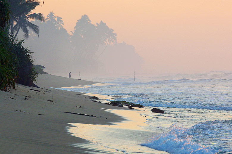 Misty dawn on Negombo Beach