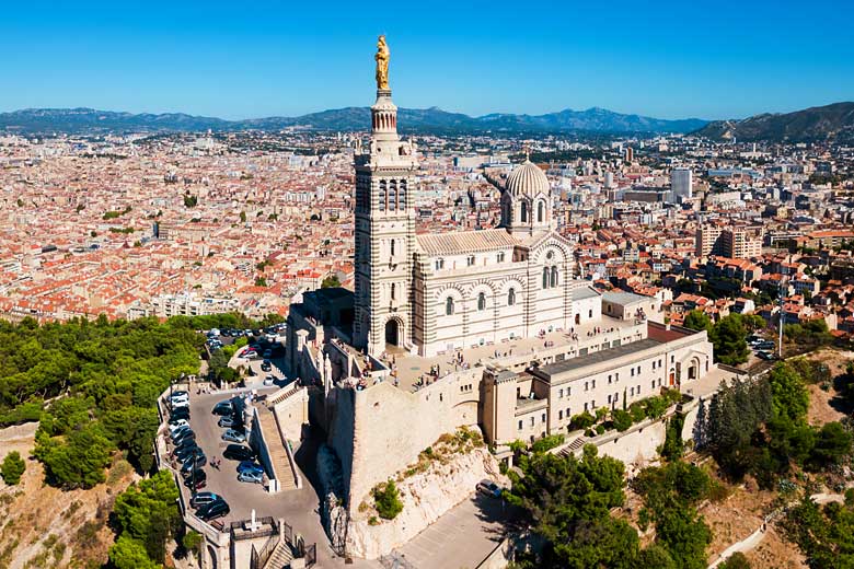 The church of Notre Dame de la Garde towers over Marseille The church of Notre Dame de la Garde towers over Marseille
