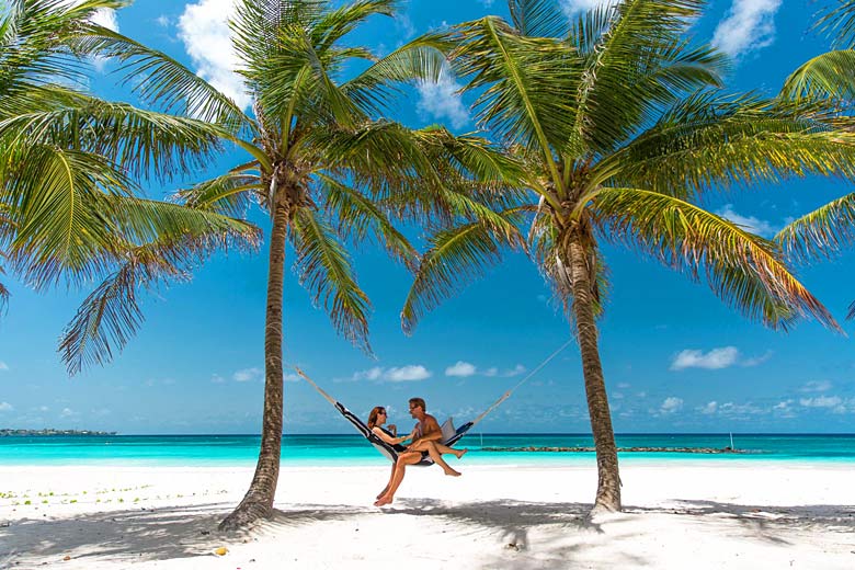 Take a break on the platinum sands at Sandals Barbados