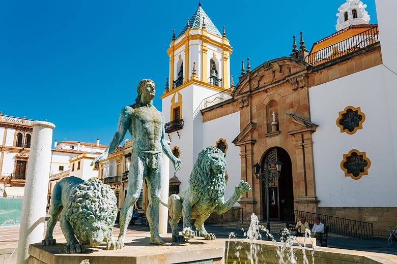 The famous Plaza del Socorro fountain in Ronda The famous Plaza del Socorro fountain in Ronda