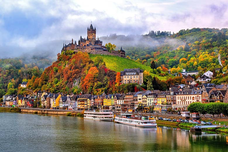 Reichsburg Castle, Cochem in an autumn mist Reichsburg Castle, Cochem in an autumn mist