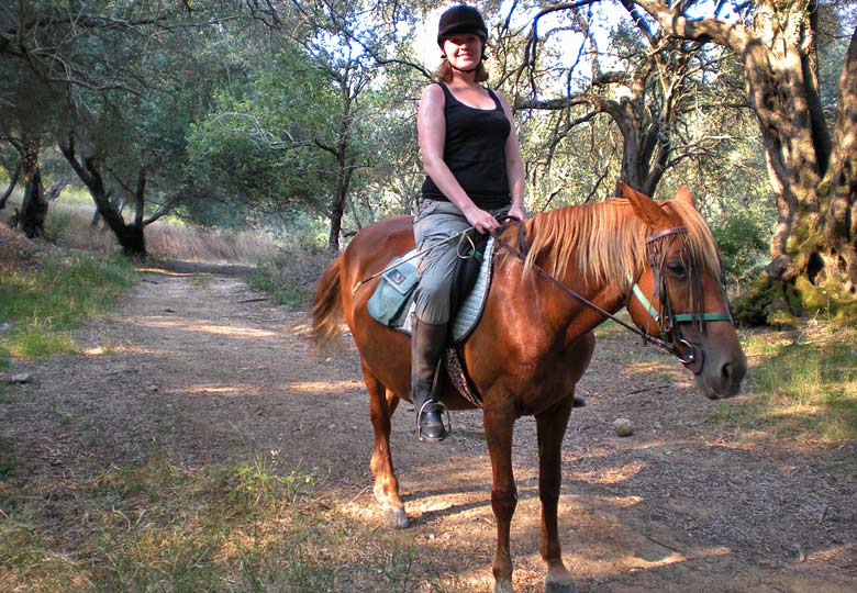 Riding in the foothills of the Pantokrator Mountains Riding in the foothills of the Pantokrator Mountains
