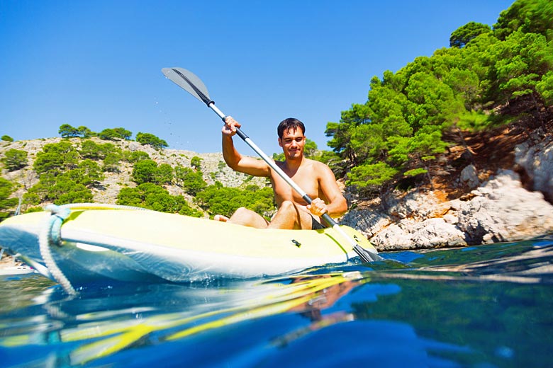 Navigate Ibiza's rocky coastline in a sea kayak Navigate Ibiza's rocky coastline in a sea kayak