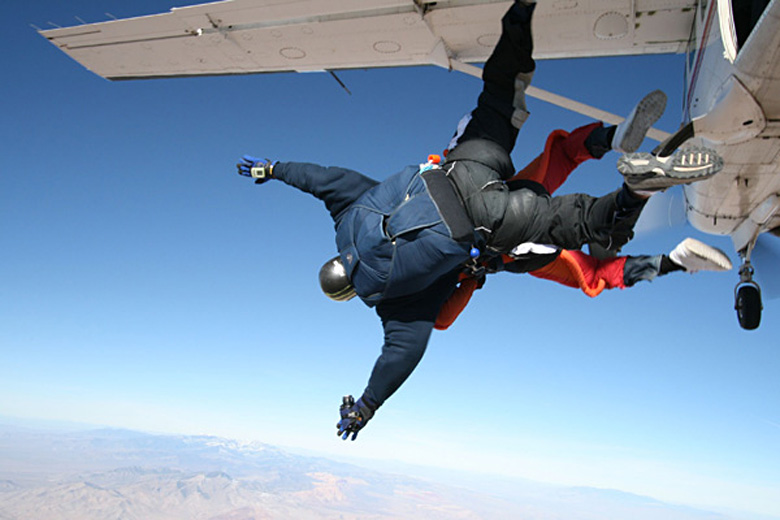 Jumping out in tandem at 15,000 feet Jumping out in tandem at 15,000 feet