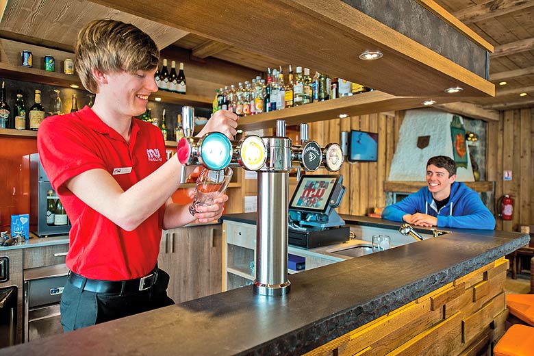 The spacious bar at Chalet Hotel Aiguille Percée The spacious bar at Chalet Hotel Aiguille Percée