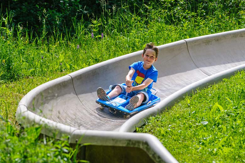 Enjoying some fair-weather tobogganing