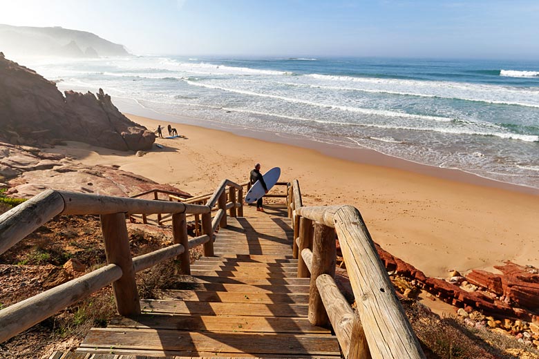 Heading down to catch the surf on Praia do Amado Heading down to catch the surf on Praia do Amado