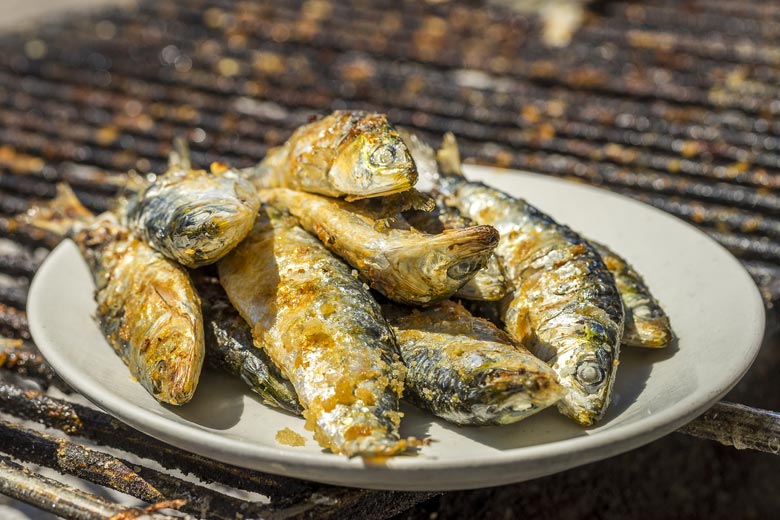 Traditional grilled sardines, Algarve, Portugal Traditional grilled sardines, Algarve, Portugal